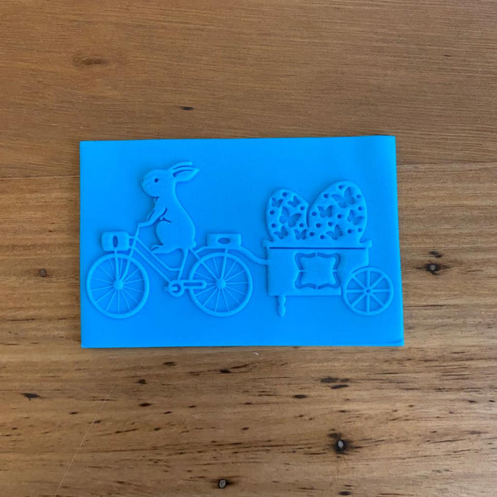 Easter Bunny on a Bicycle towing a trailer with an egg Deboss Raised Effect Stamp & Cutter, Pop Stamp, deboss stamp and cookie cutter, cookie cutter store