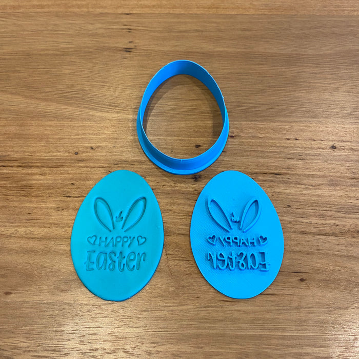 Happy Easter Style #5 Egg Cutter and Emboss Stamp. The Egg cutter measures 80mm tall by 55mm wide.   See our complete range by searching "Easter" in store  The stamp is also designed to be used within a circle measuring 70mm if you prefer a round cookie