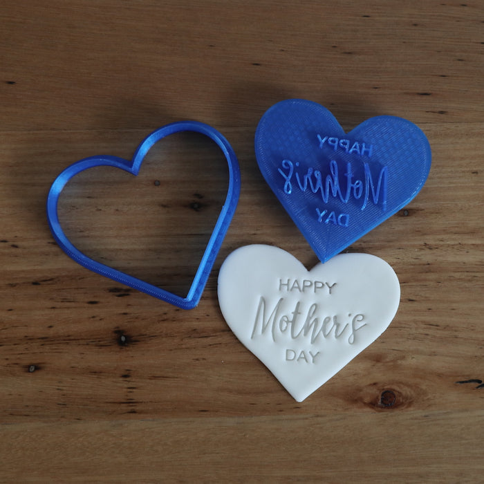 "Happy Mother's Day" style #2 heart shaped stamp emboss and matching cutter   This design measures approx 75mm wide x 65mm tall and is a 2 piece set; the heart shaped cutter for your cookie / fondant and the matching stamp.