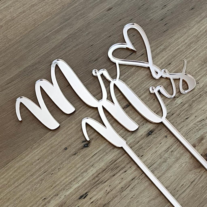 "Mr & Mrs" in rose gold acrylic cake topper available in many colours, mirrored finish and glitters, Cookie Cutter Store