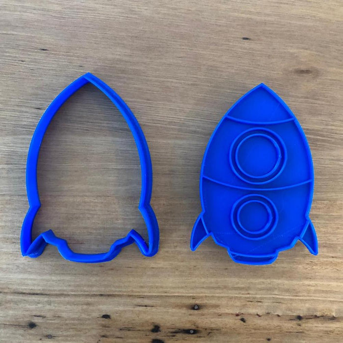 Rocket Cookie Cutter with Optional Stamp measures approx. 90mm tall by 60mm wide.  This Rocket design comes with the option of the outline cutter, or with the perfectly fitted Stamp which you can use to help with decorating, or to stamp into a plain cookie.  Also, don't miss our other Space themed cookie cutters, search for "Space" in our search bar