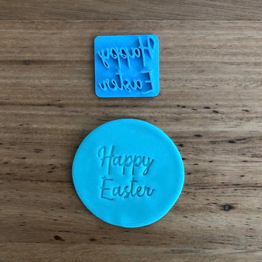 Happy Easter Style #3 Emboss Stamp. The words measure 35mm wide and 33mm tall and this stamp is perfect for customising your own cookies by placing the text anywhere your design requires, allowing you to place names or decorations around the text.